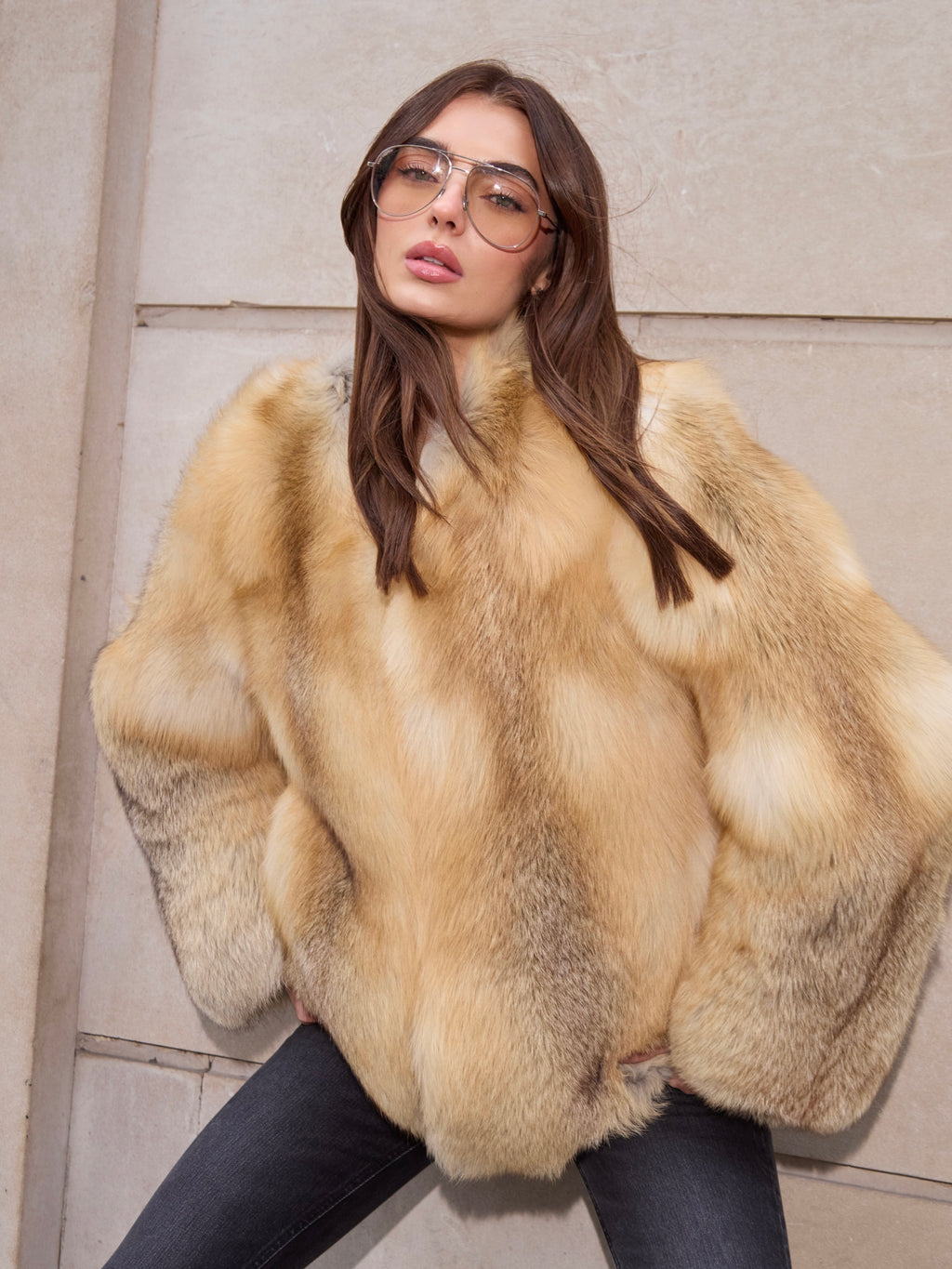 Anouska Golden Fox Fur Coat in natural golden fox fur with loose oversized shape, styled with black trousers.