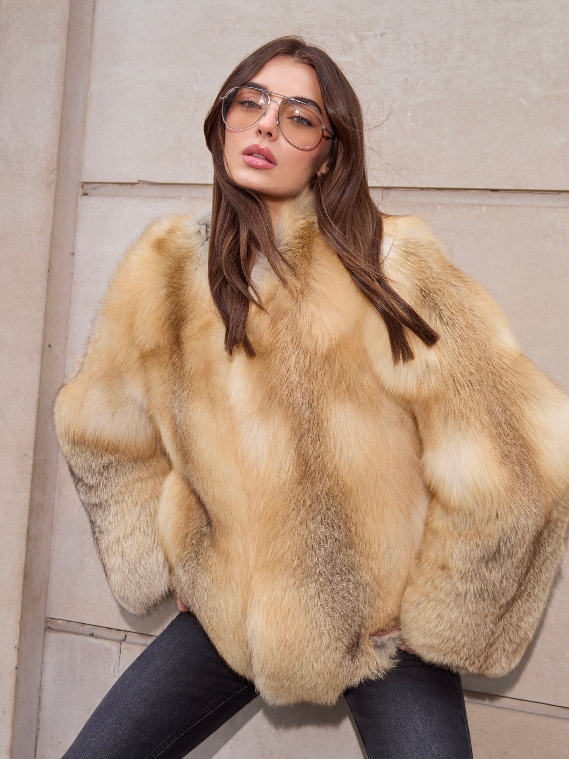 Anouska Golden Fox Fur Coat in natural golden fox fur with loose oversized shape, styled with black trousers.