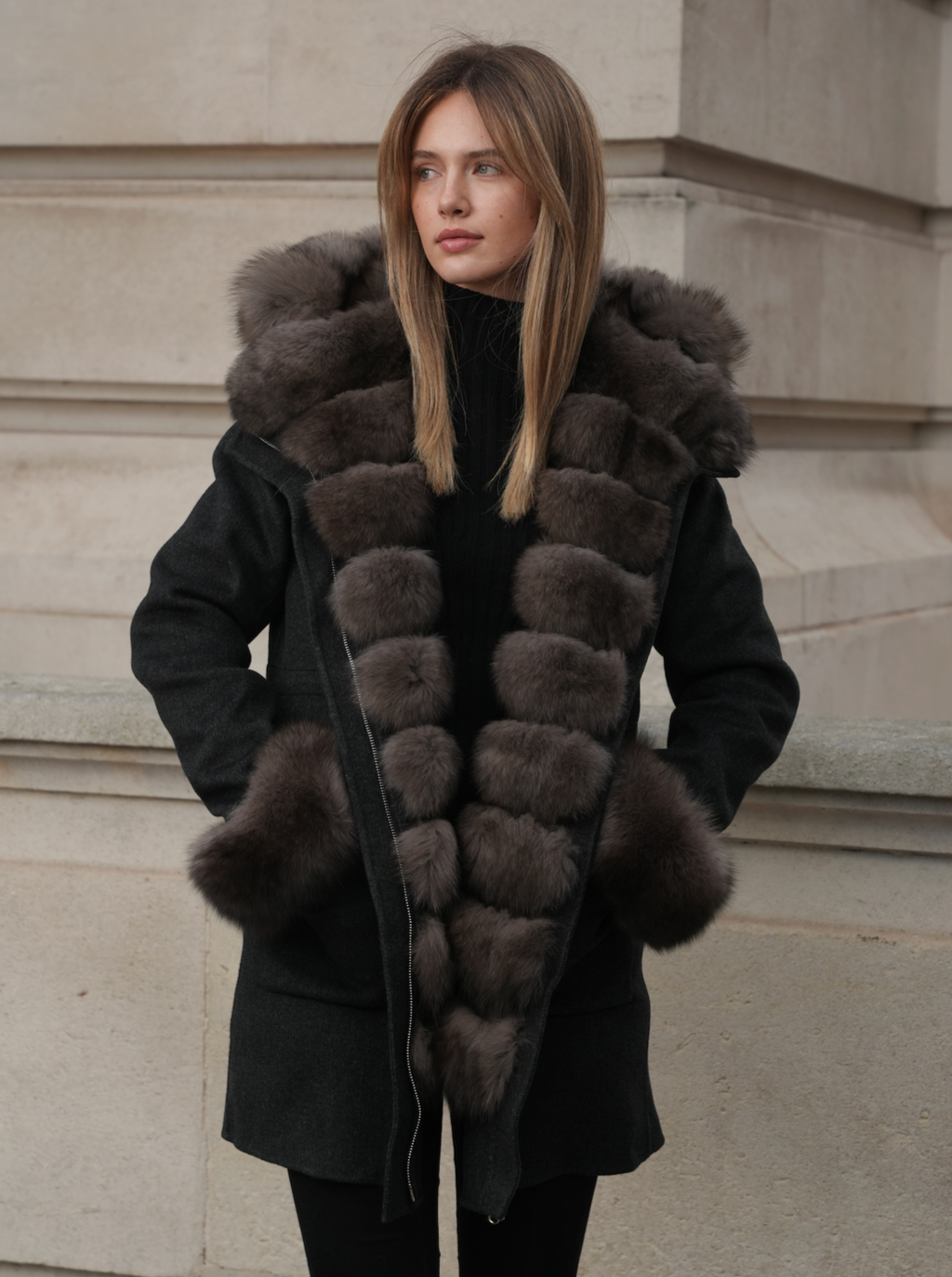 Full length view of L.CUPPINI dark grey merino wool coat with fox fur lining and hood