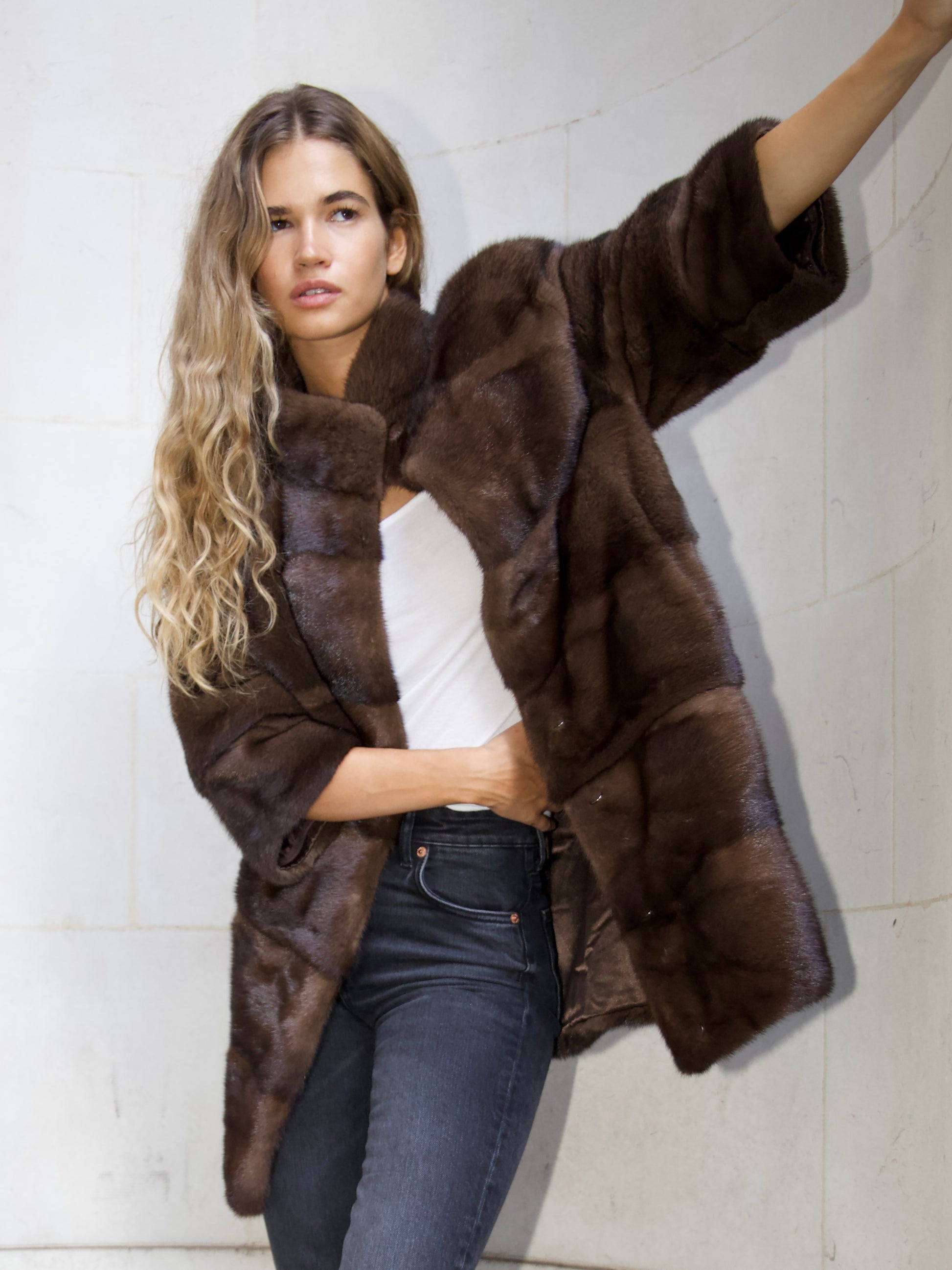 The Charlotte 6 in 1 Coat in chocolate brown by L.CUPPINI, worn open with white top and jeans