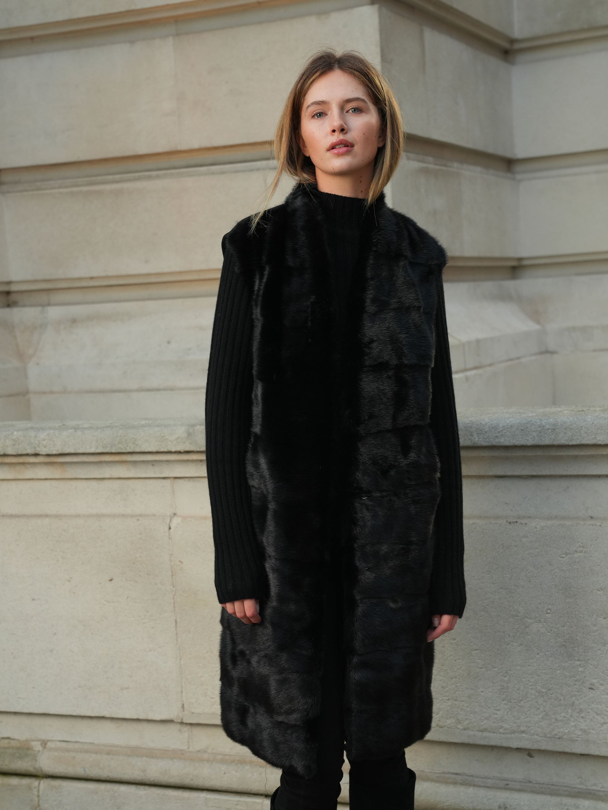 The Vera Gilet by L.CUPPINI in black, featuring a pure mink fur front and cashmere wool blend back